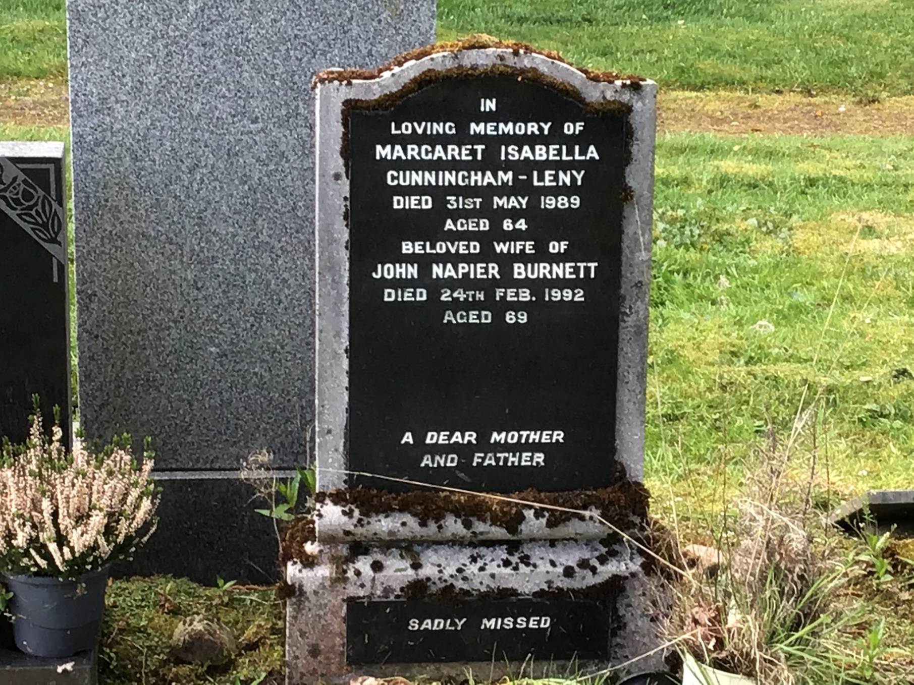 A grave stone with text on it

AI-generated content may be incorrect.